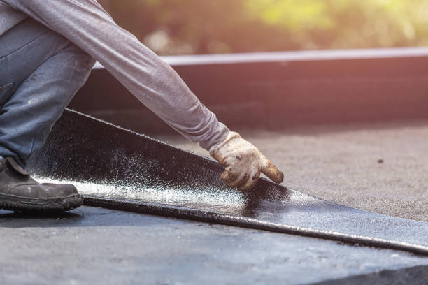 Professional Basement Waterproofing technician working in Laurel, VA